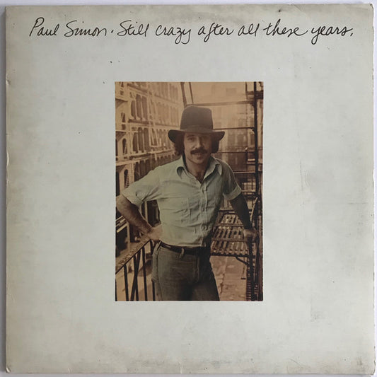 Paul Simon , Still Crazy After All These Years..( Embossed ) VG+VG